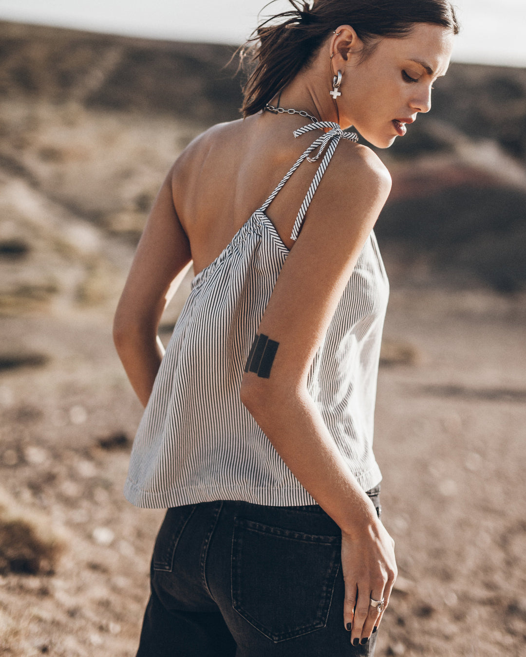 The Striped Asymmetrical Top