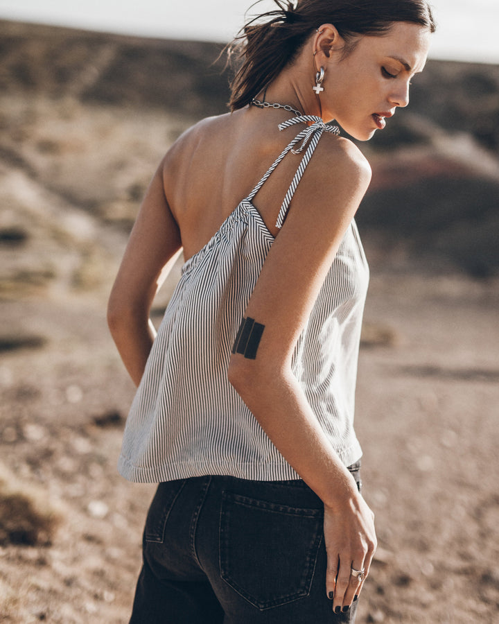 The Striped Asymmetrical Top